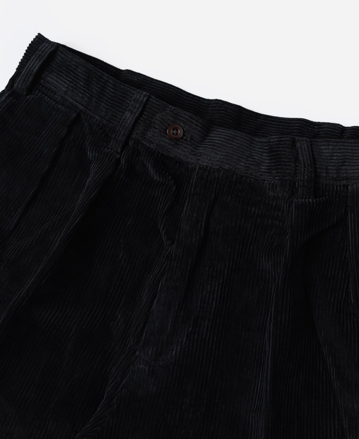Pantalon plissé homme en velours côtelé noir, coupe ample à revers