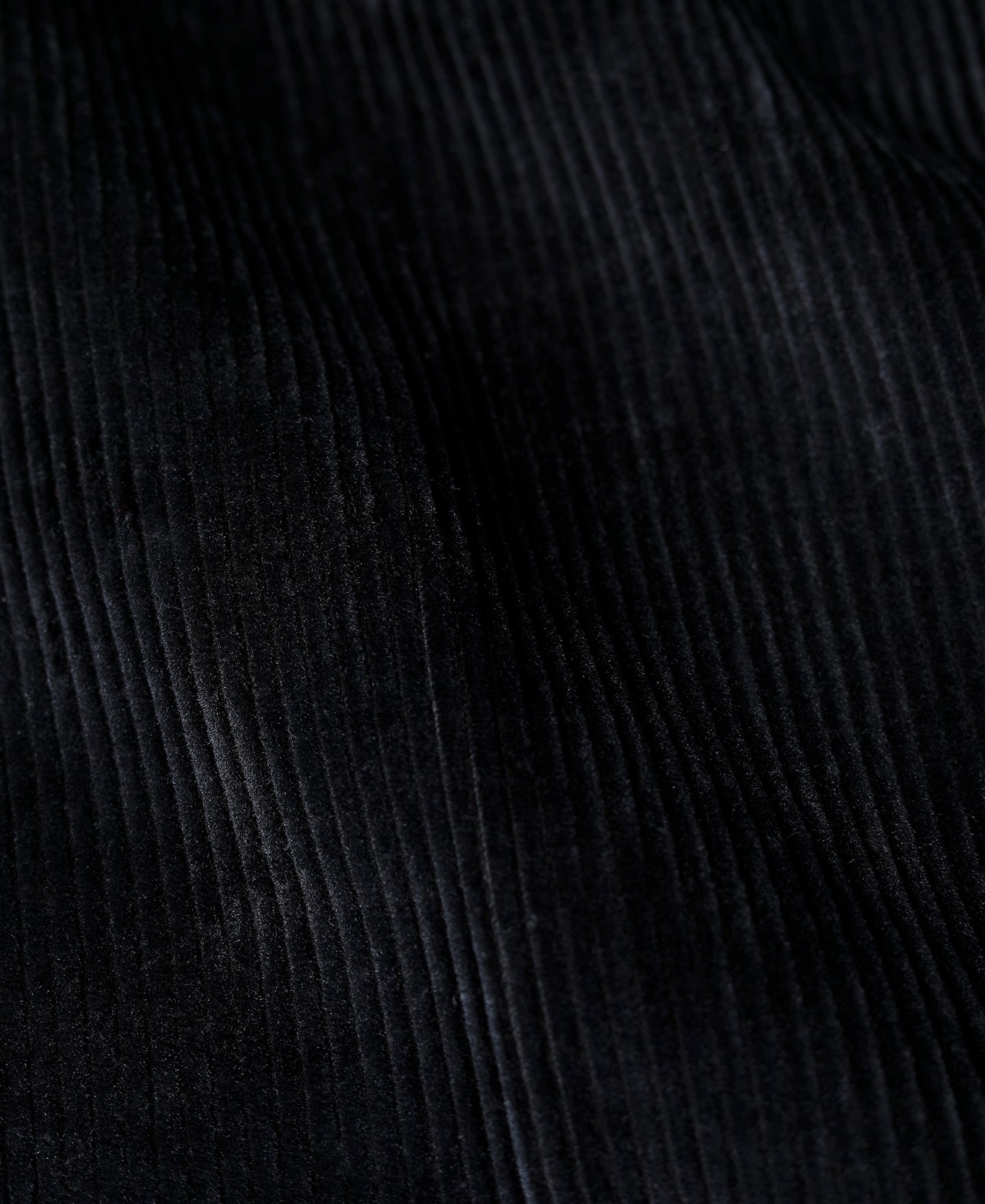 Pantalon plissé homme en velours côtelé noir, coupe ample à revers