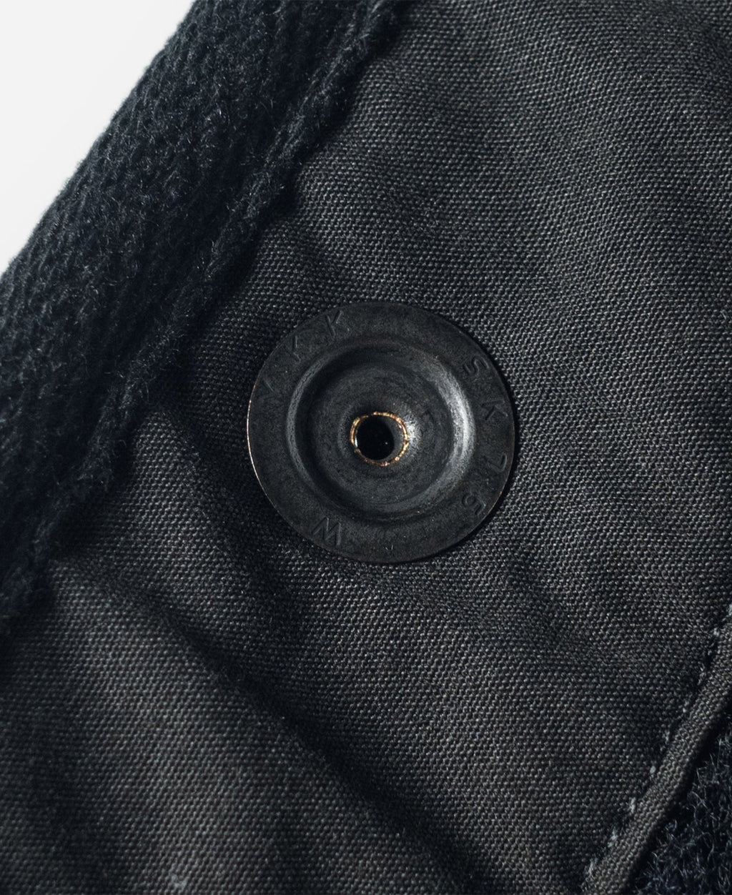 Gilet en laine mélangée poivre et sel à quatre poches avec liseré noir coupe classique