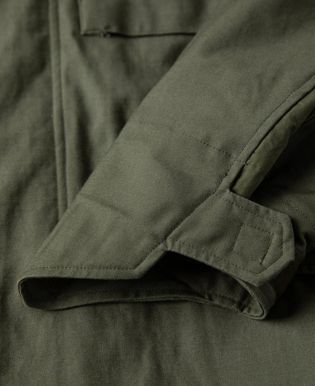Veste militaire de terrain olive avec col montant et quatre poches