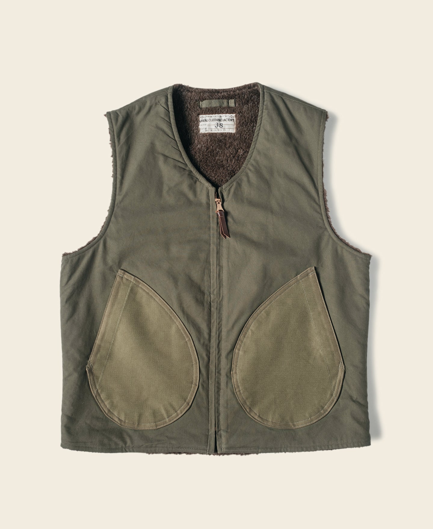 Gilet zippé doublé polaire olive avec grandes poches avant
