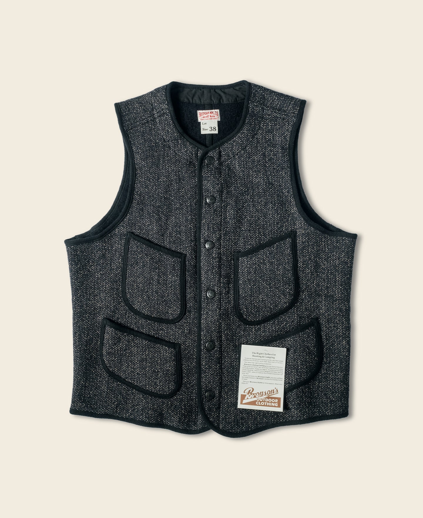 Gilet en laine mélangée poivre et sel à quatre poches avec liseré noir coupe classique