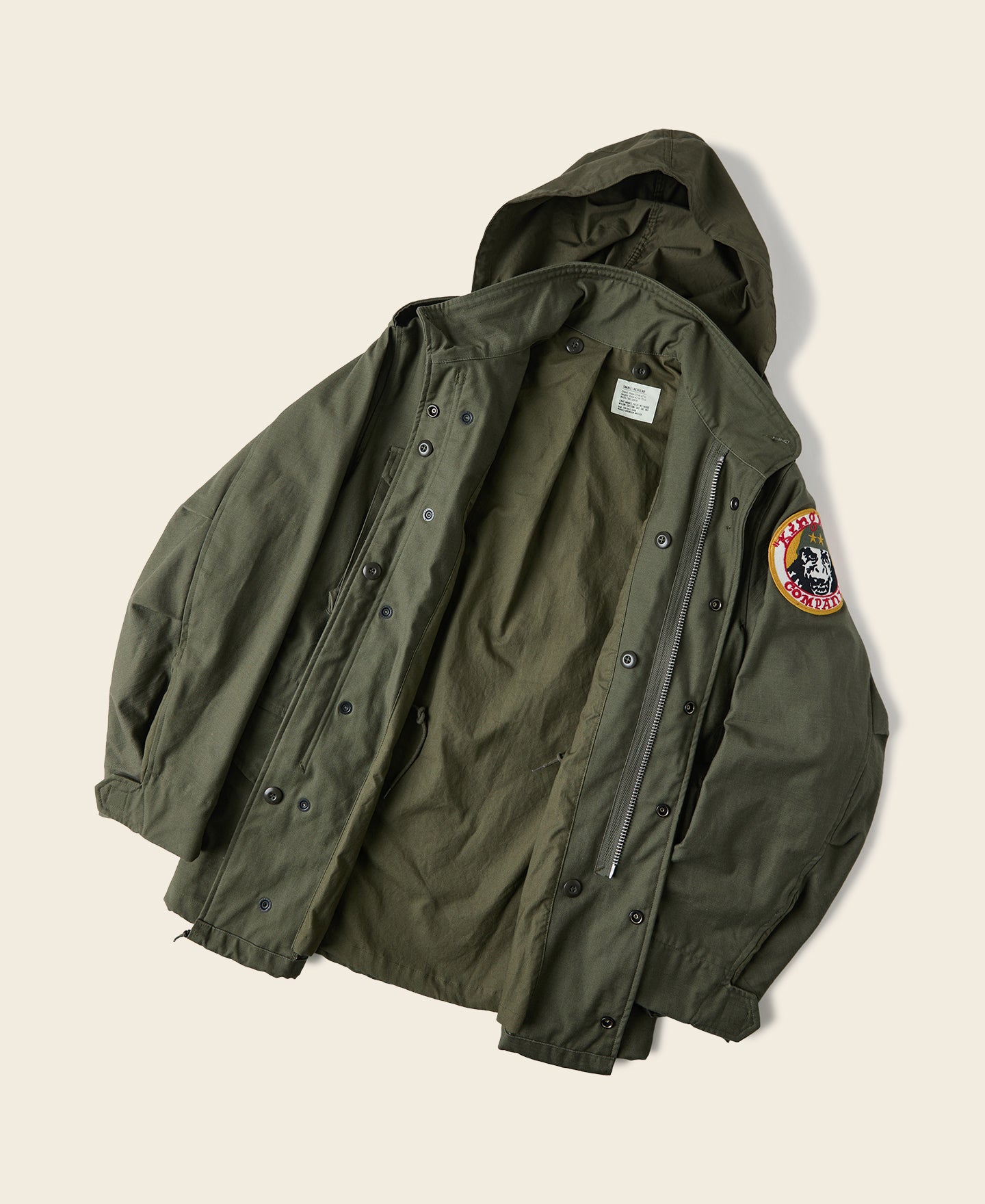 Veste militaire M-65 vert olive avec écussons brodés