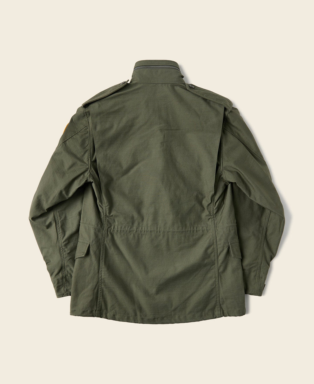 Veste militaire M-65 vert olive avec écussons brodés