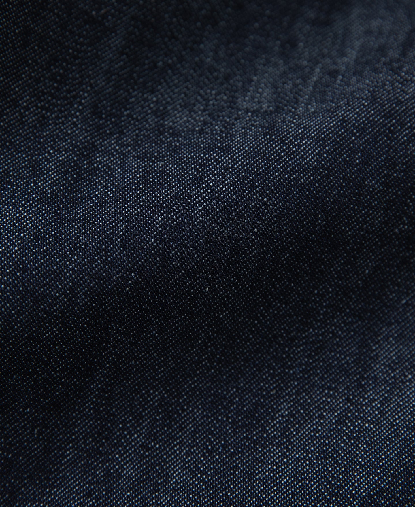 Jean toile indigo coupe large style peintre avec surpiqûres contrastantes