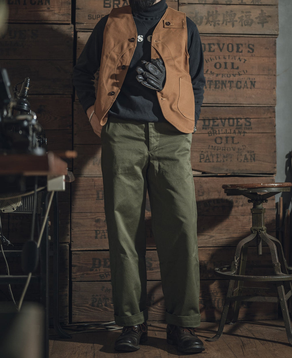 Gilet de chasse kaki épais en toile avec poches à gibier et fermeture boutonnée