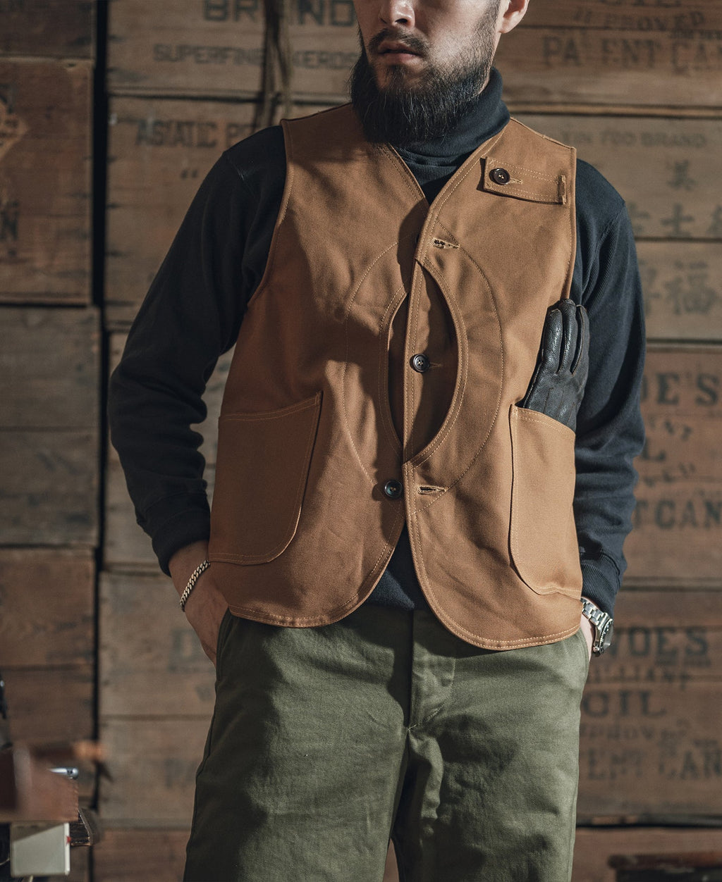 Gilet de chasse kaki épais en toile avec poches à gibier et fermeture boutonnée