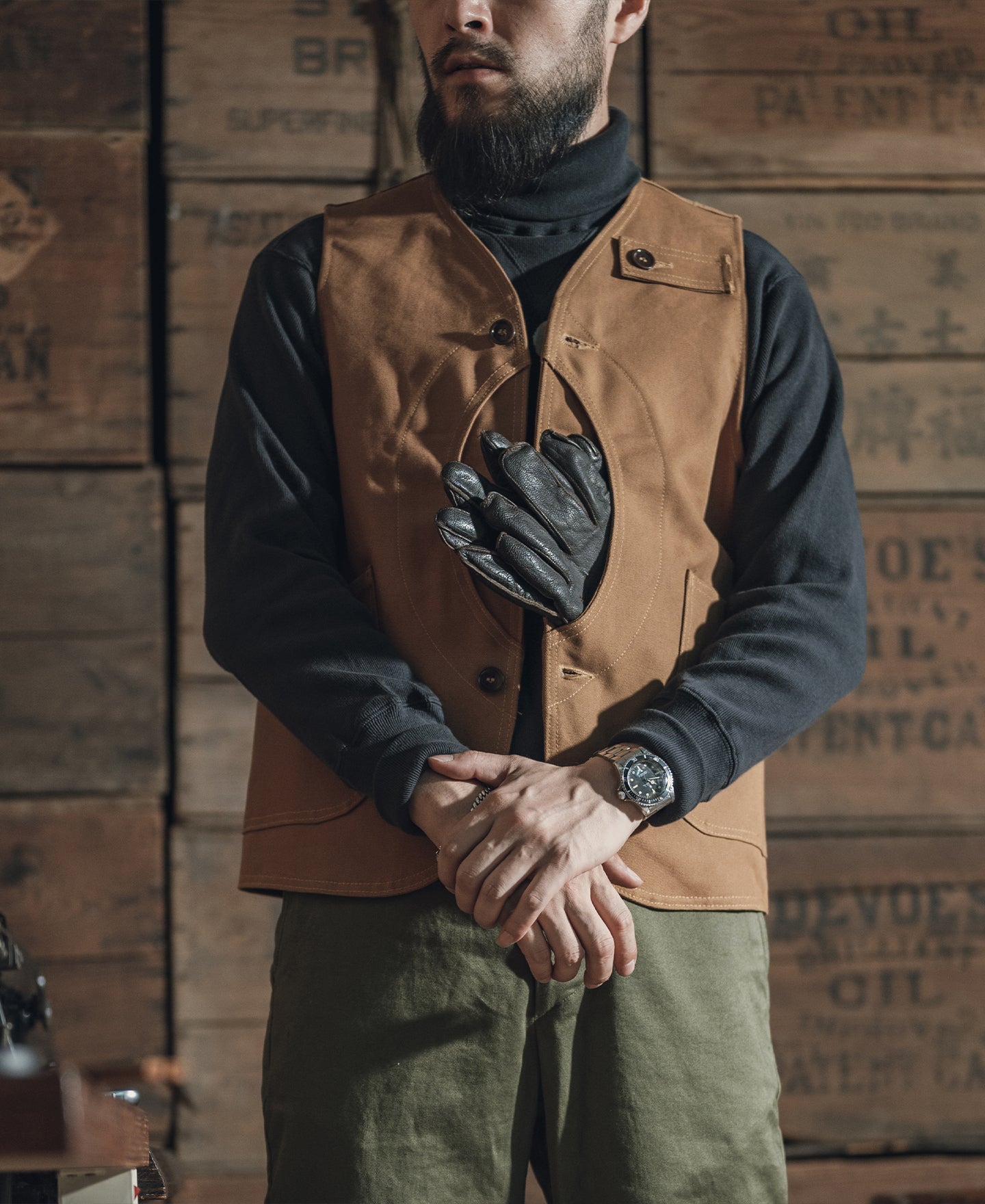 Gilet de chasse kaki épais en toile avec poches à gibier et fermeture boutonnée