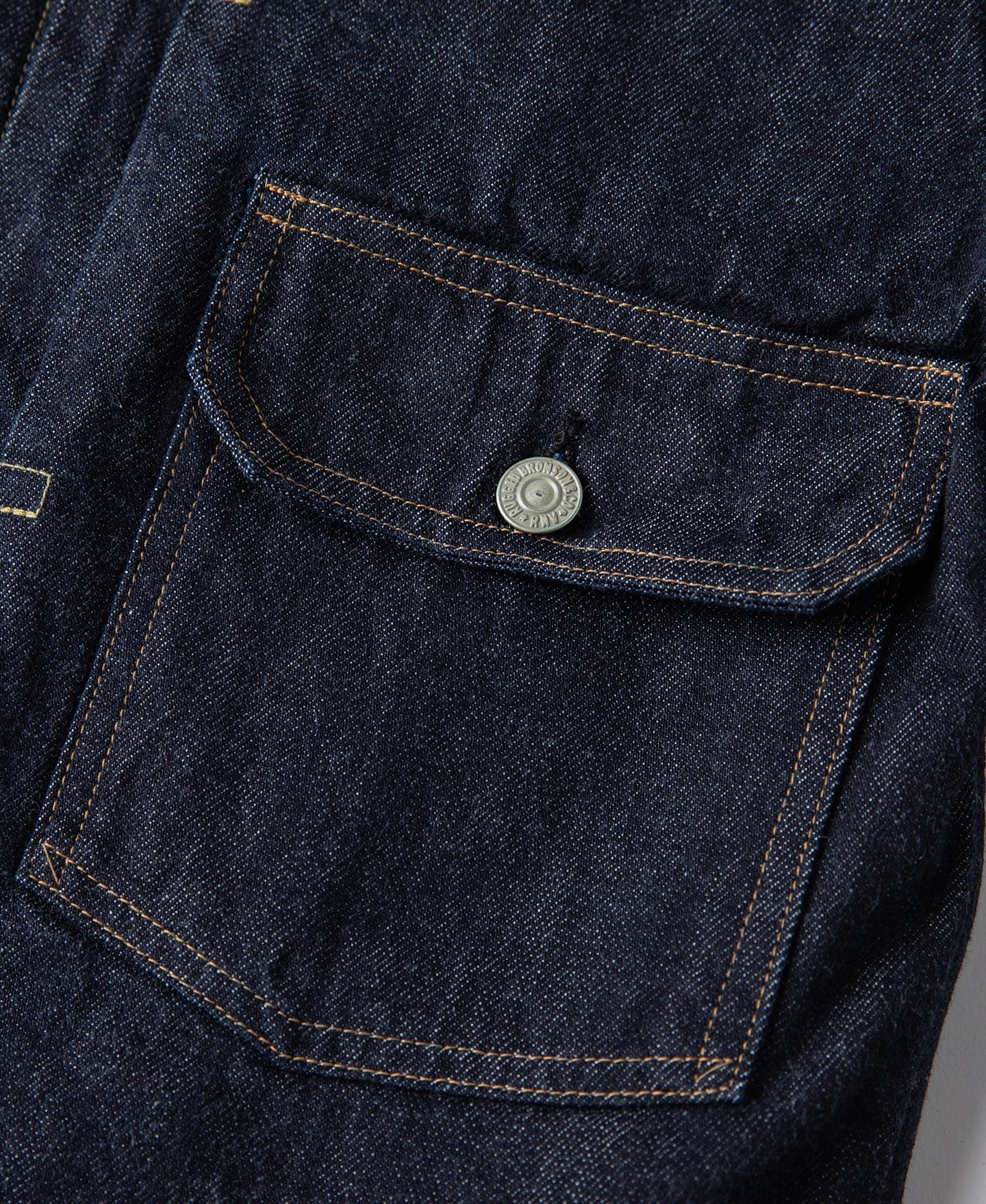 Blouson camionneur en jean doublé de couverture indigo, poche poitrine simple, style vintage