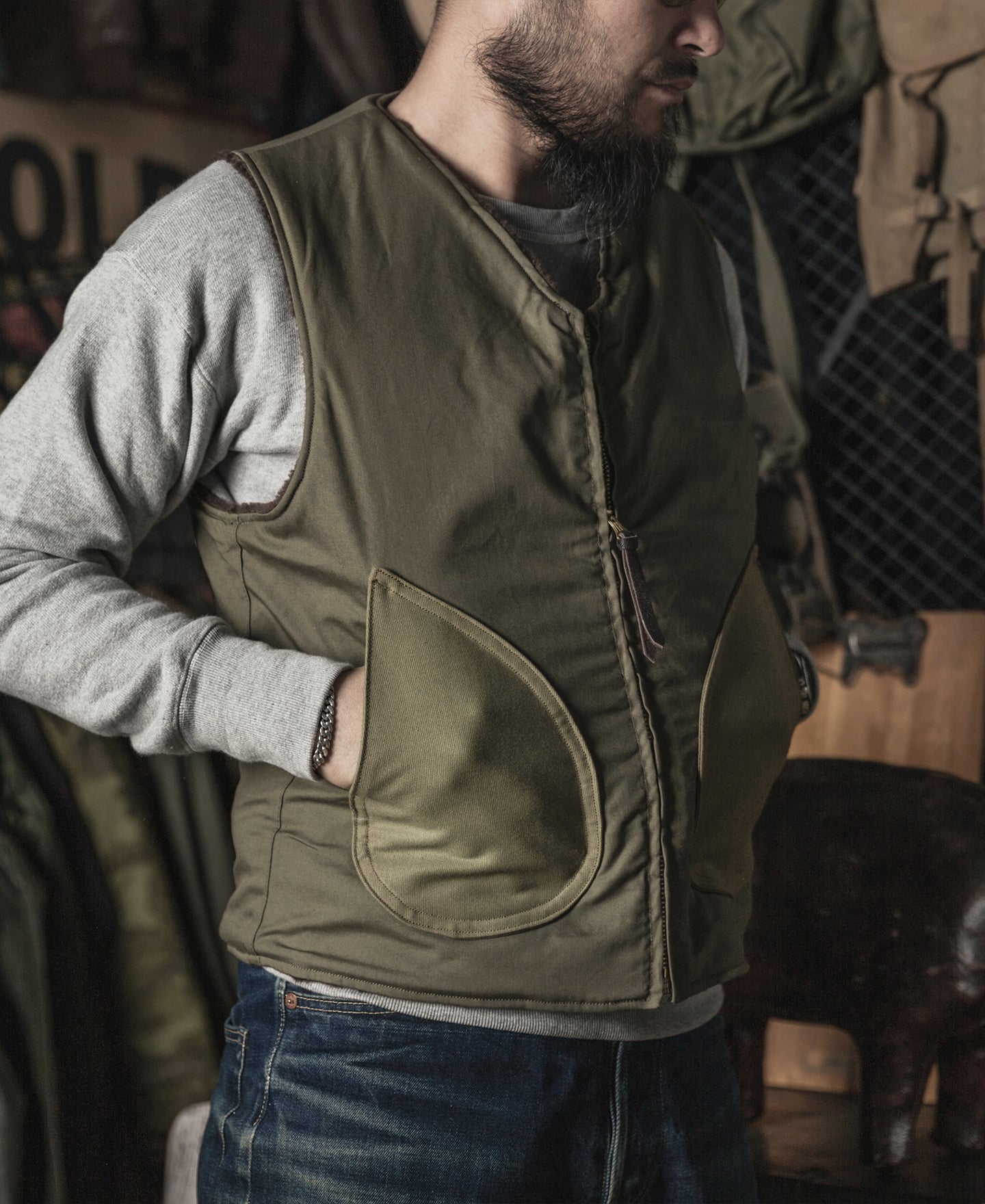 Gilet zippé doublé polaire olive avec grandes poches avant
