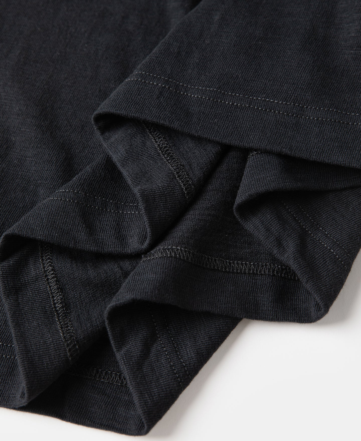 T-shirt tubulaire à col rond et manches courtes en coton noir épais