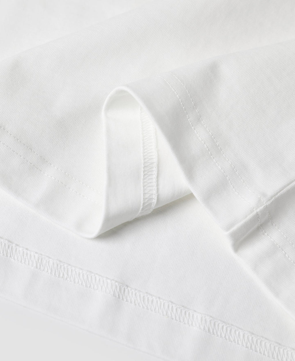 T-shirt à col Henley à manches courtes, patte de boutonnage blanche, coupe ajustée