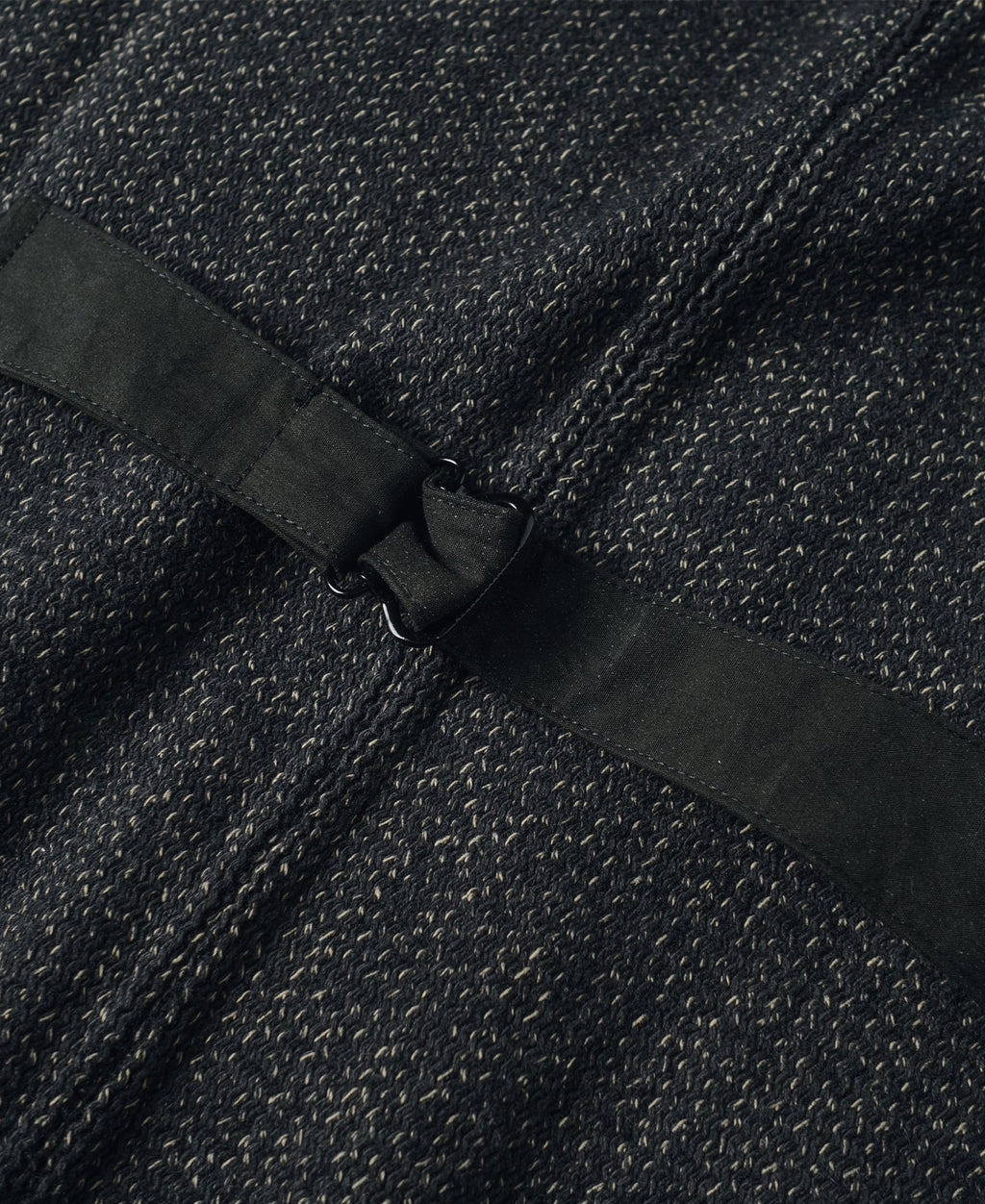 Gilet en laine mélangée poivre et sel à quatre poches avec liseré noir coupe classique