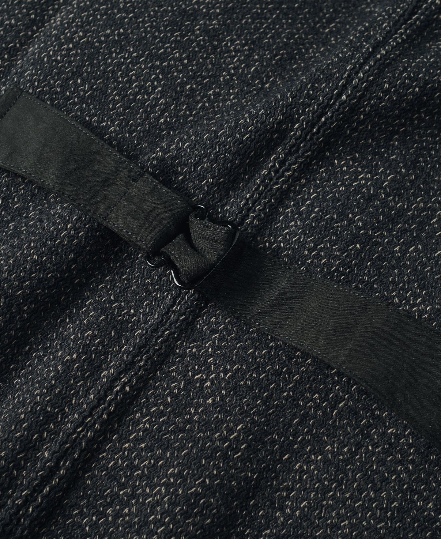 Gilet en laine mélangée poivre et sel à quatre poches avec liseré noir coupe classique