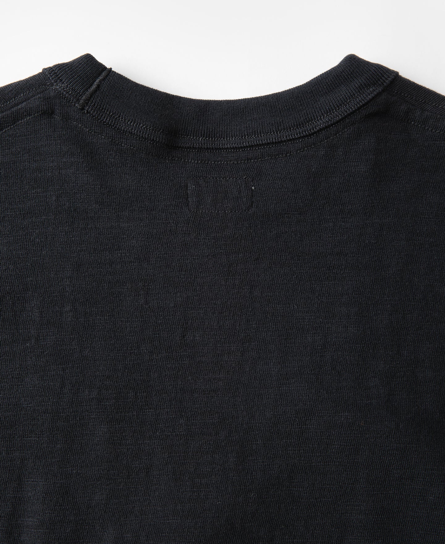 T-shirt tubulaire à col rond et manches courtes en coton noir épais